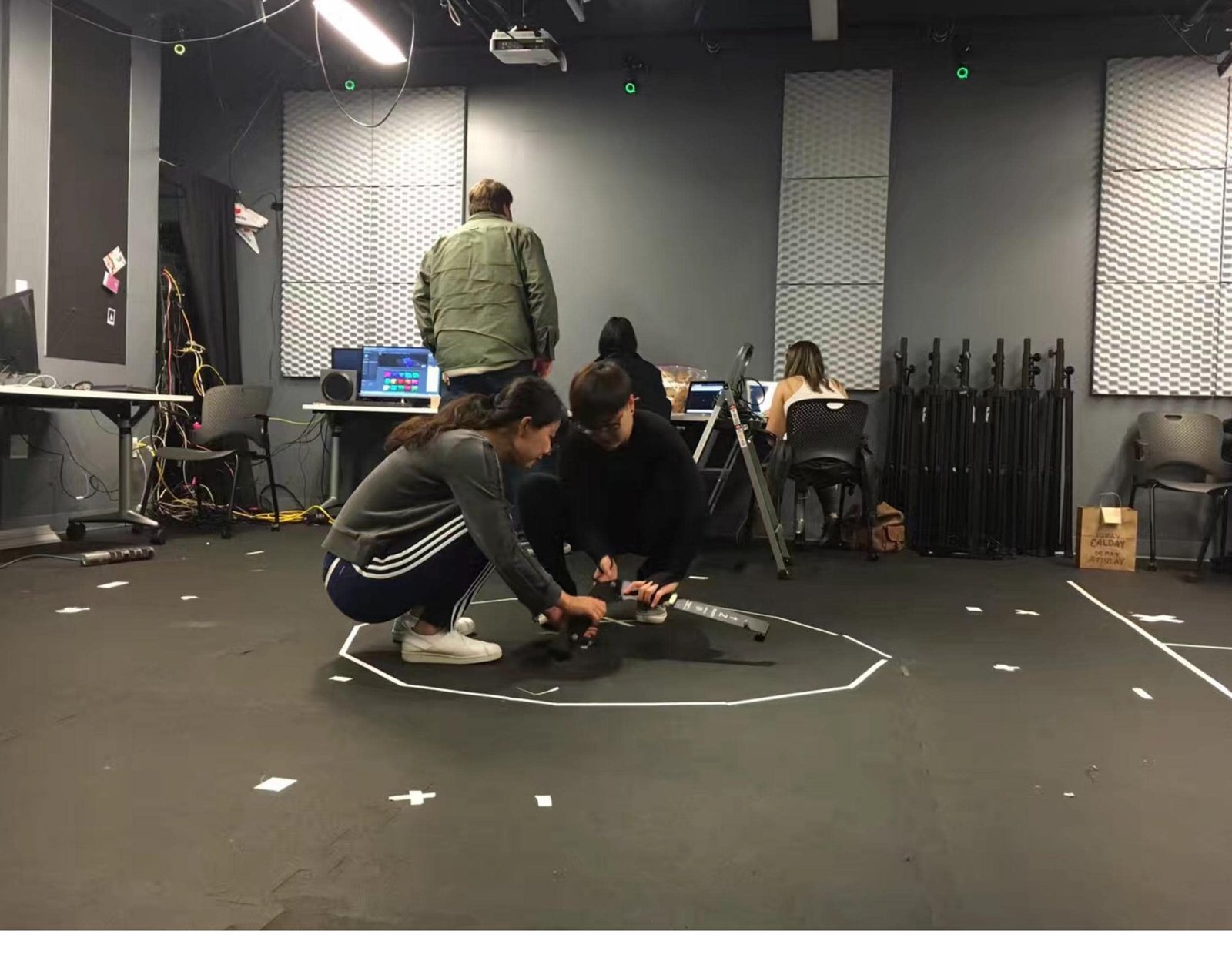Performers being 3D-scanned in a motion-capture studio