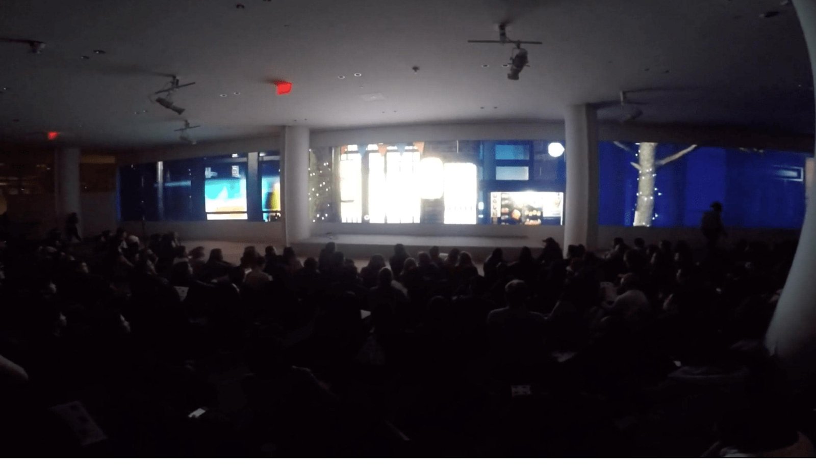 ITP Big Screen Show: audience seated before the panoramic screens